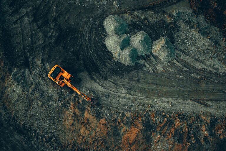 Baustelle mit Bagger, Symbol für die Bauwirtschaft